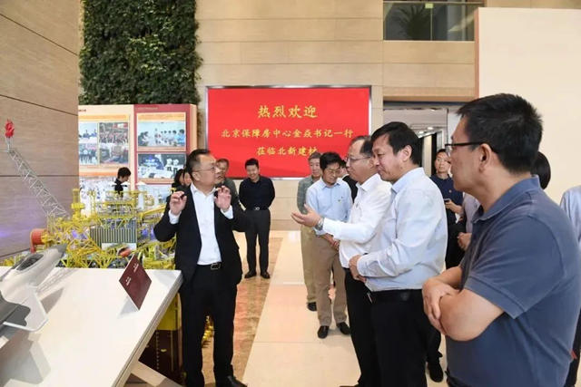 北京保障房中心党委书记金焱一行到北新建材调研交流