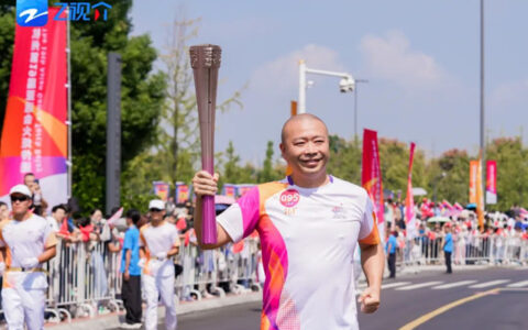 杭州亚运会火炬传递来到金华 顾家家居顾海龙担任火炬手